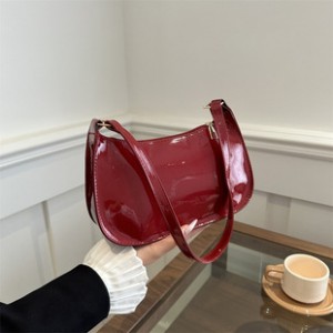Foreign trade new small bag female 2024 summer retro handheld foreign-style armpit bag patent leather pure color glossy baguette baguette