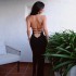 American new women's 2023 fall and winter pure desire wind sexy backless tie waist hanging neck open fork long package hip dresses