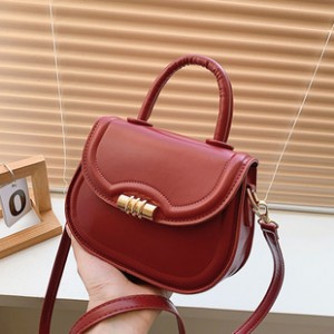 Pure color fashion net red handbag 2025 spring new hundred ins shoulder crossbody bag Yankee saddle bag female